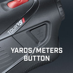 Bushnell Golf Tour V5 Shift laser rangefinder demonstration photo of yards/meters button.